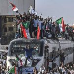 Handen af van de communisten van Soedan! Weg met het coup-regime!